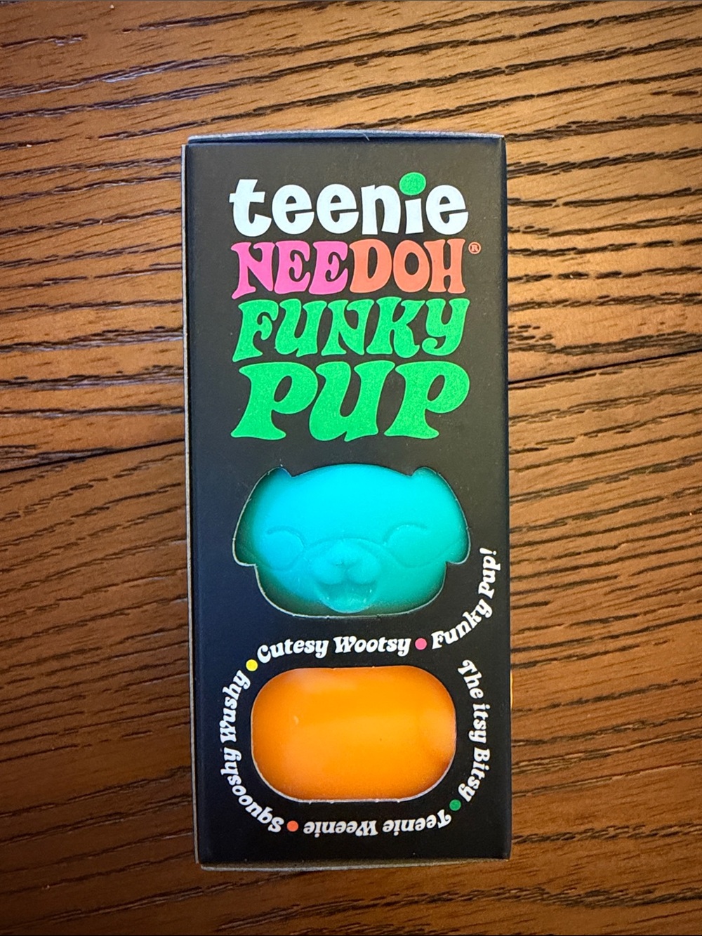 teenie NEE DOH Funky Pup Sensory Squeeze Toy - Teal & Orange